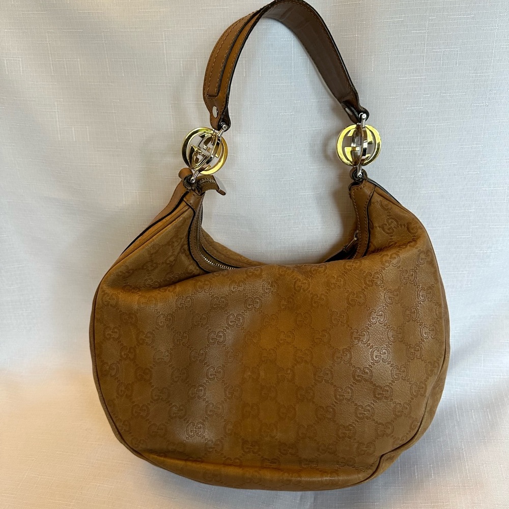 Gucci tan leather crescent bag